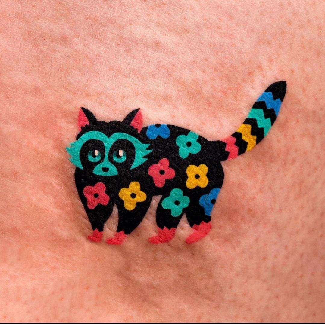Photo of the tattoo titled My Little Trash Cat