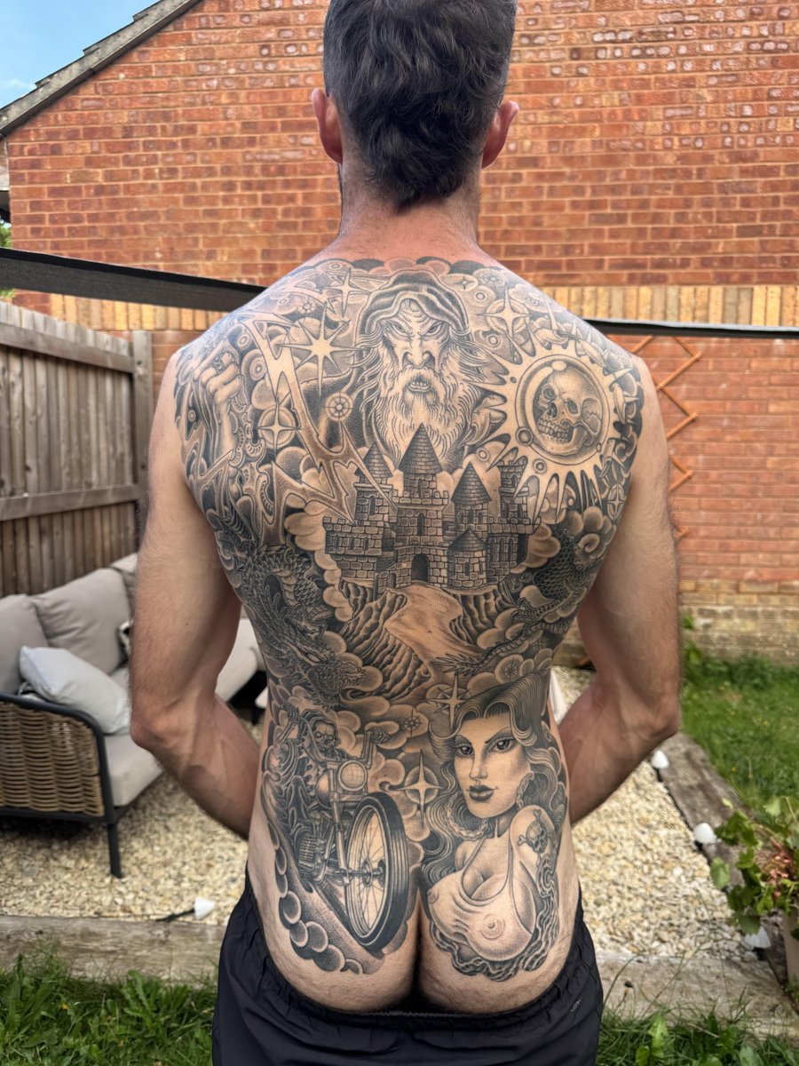 Photo of the tattoo titled Epic Back Piece: A Long Tattoo Journey