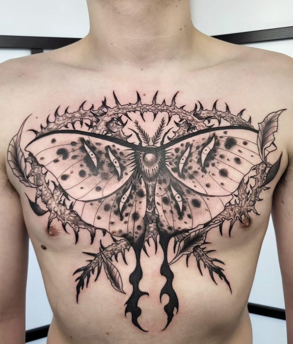 Photo of the tattoo titled Moth's Transformation and Rebirth