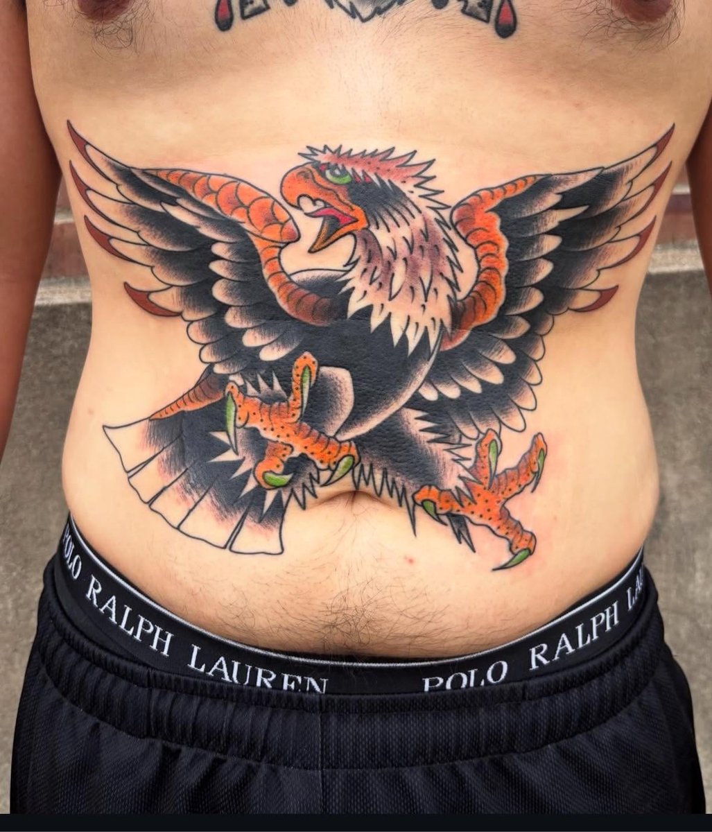 Photo of the tattoo titled Eagle Stomach Tattoo Triumph