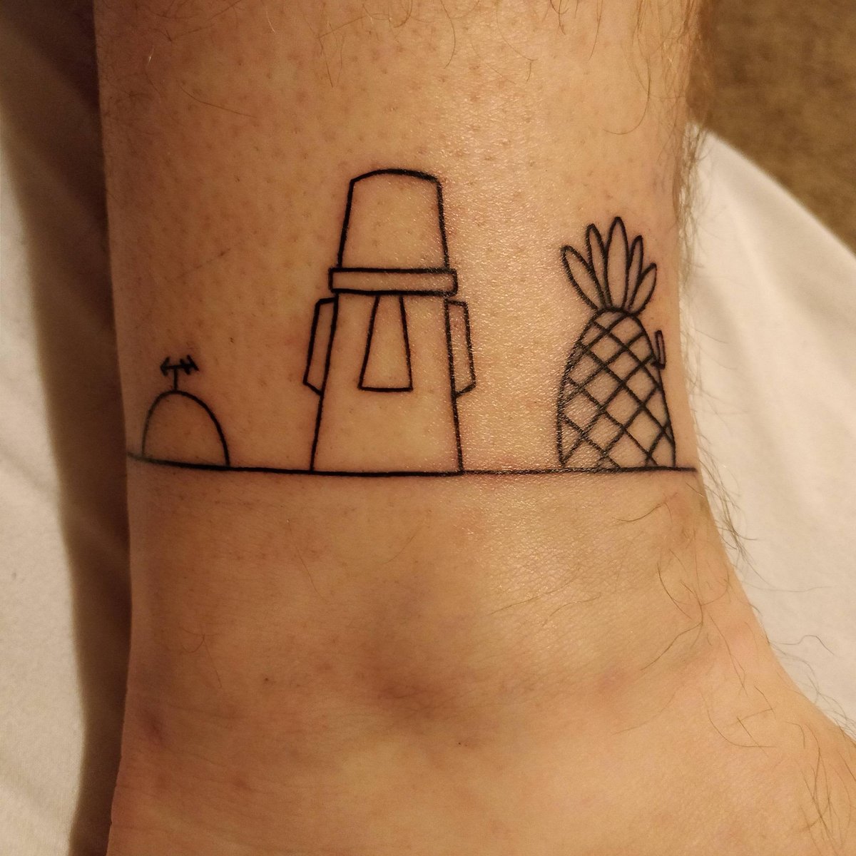Photo of the tattoo titled Childhood Neighborhood Homage