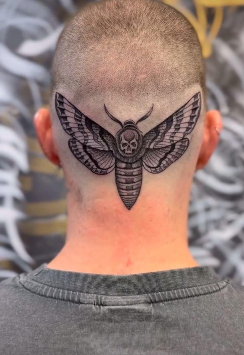 Photo of the tattoo titled Adding to Death Moth Tattoo