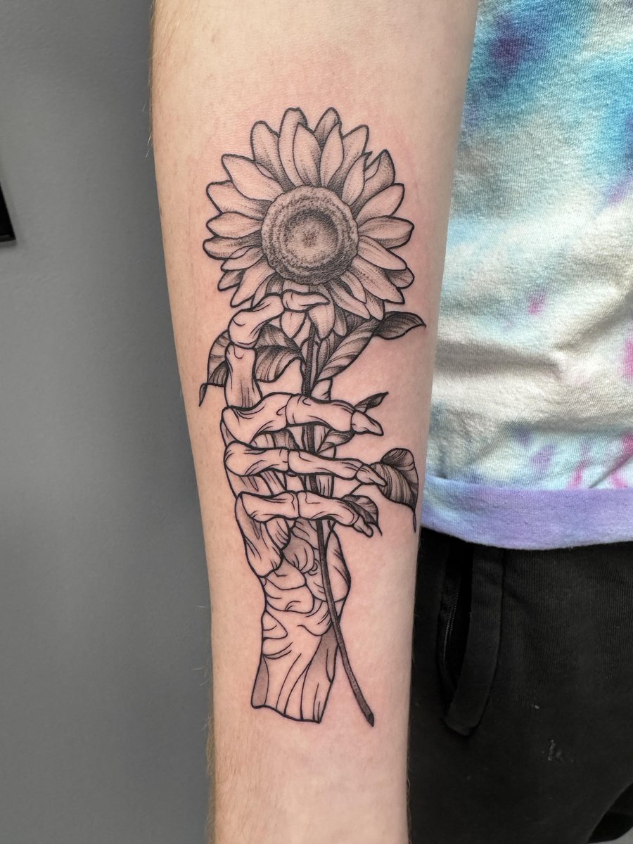 Photo of the tattoo titled My First Sunflower Skeleton Tattoo