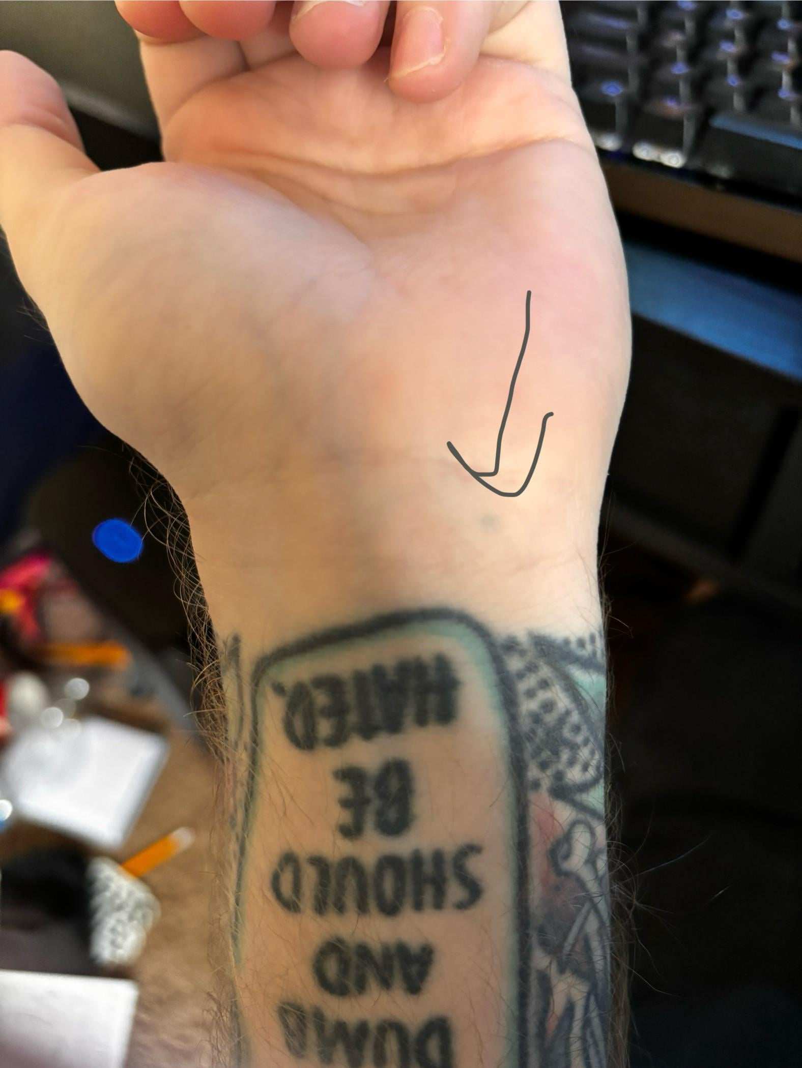 Photo of the tattoo titled Pencil Scar: A Childhood Memory