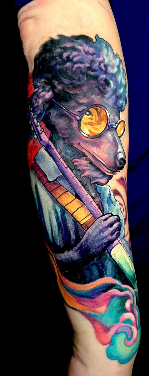 Photo of the tattoo titled My Poodle Hendrix Tribute