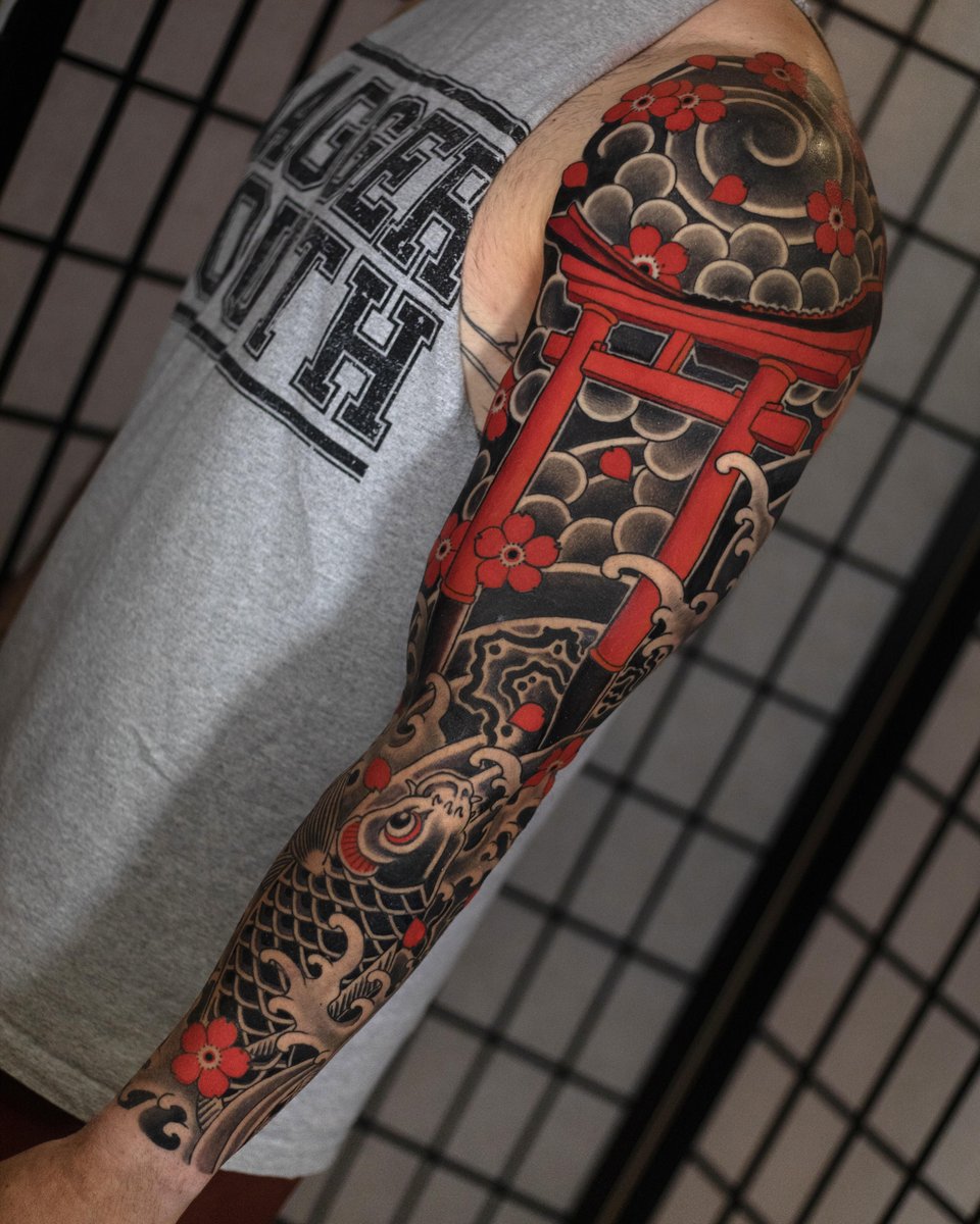 Photo of the tattoo titled Koi and Torii Gate Journey