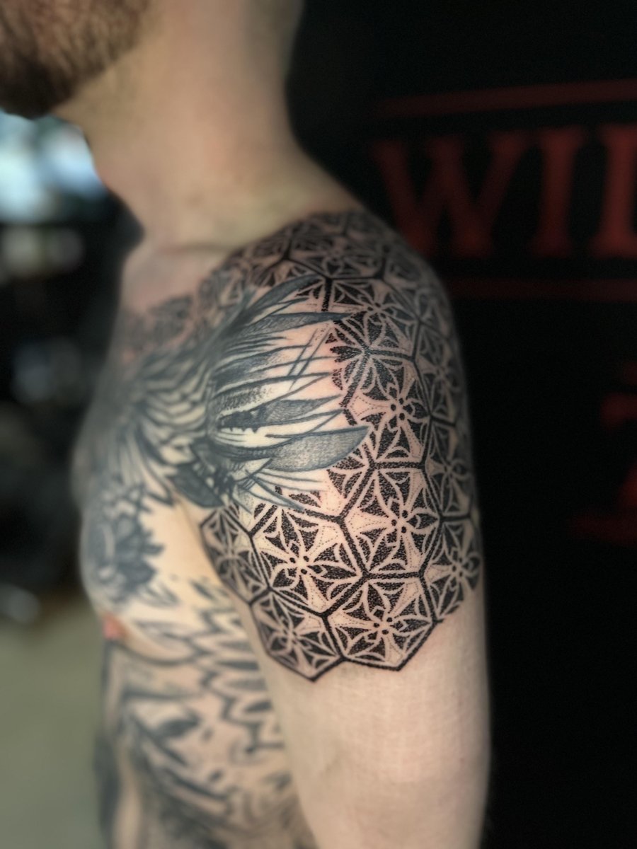 Photo of the tattoo titled Shoulders of Strength