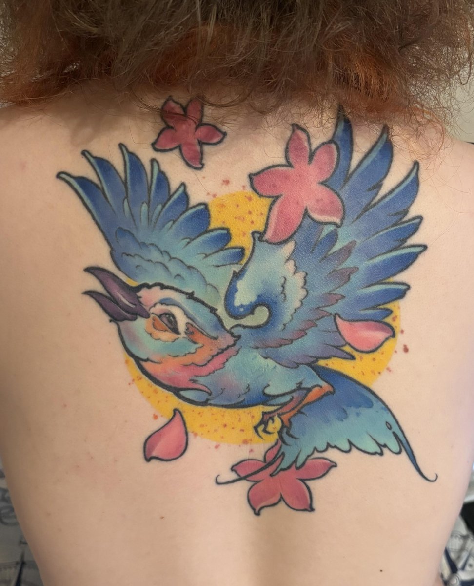 Photo of the tattoo titled African Roller's Enduring Beauty
