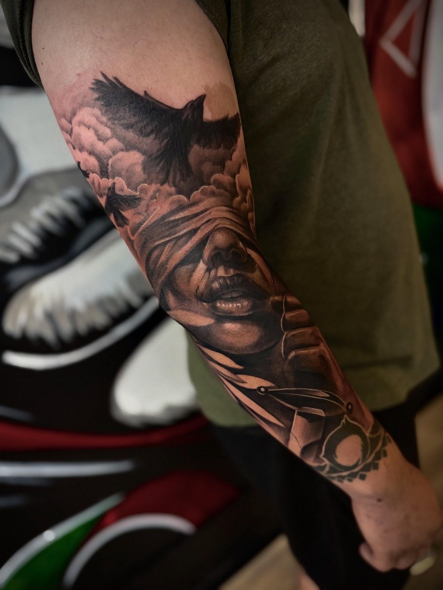 Photo of the tattoo titled Lady Justice in Progress