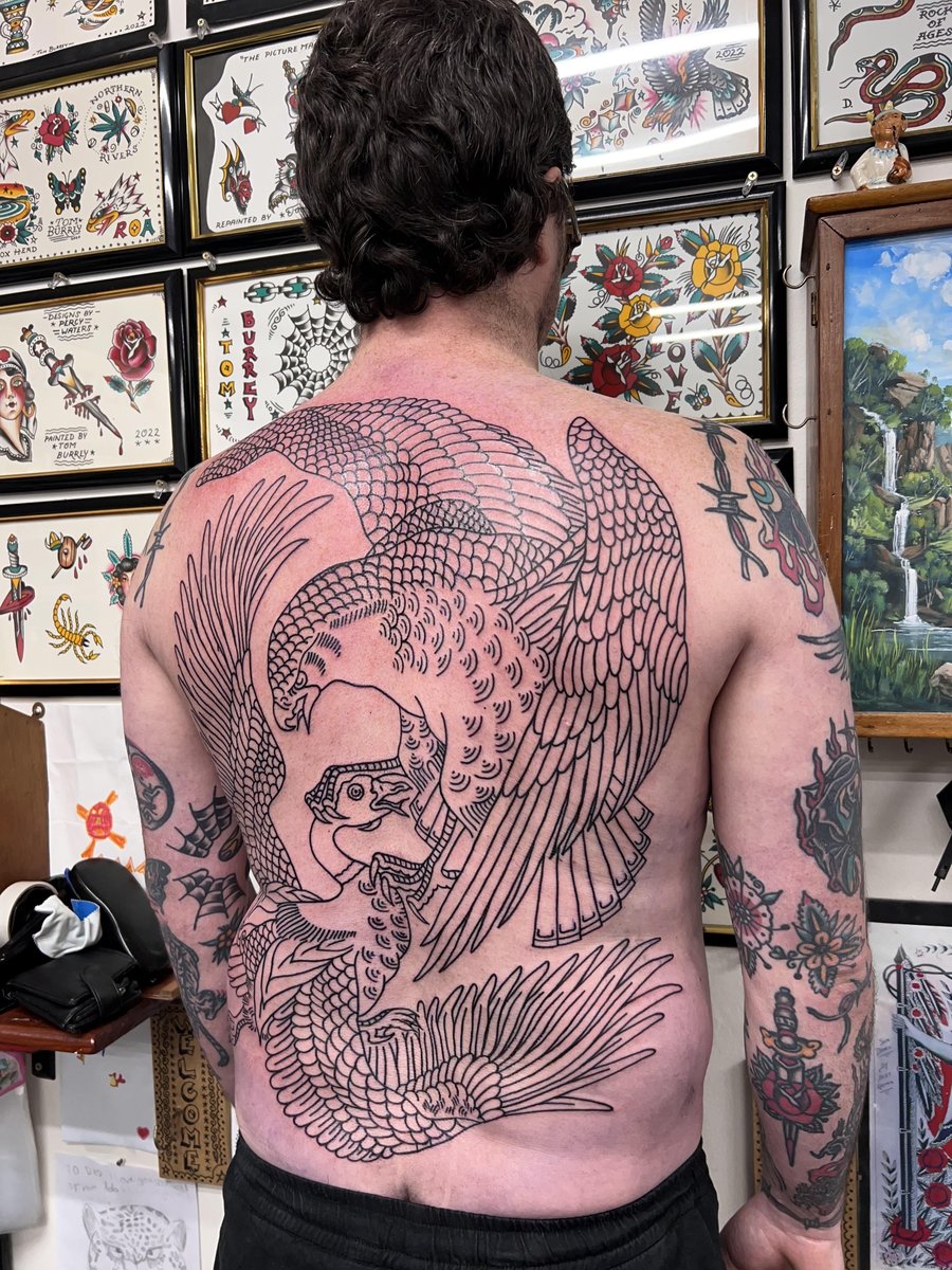 Photo of the tattoo titled Back Piece Outline: A Grueling Beginning