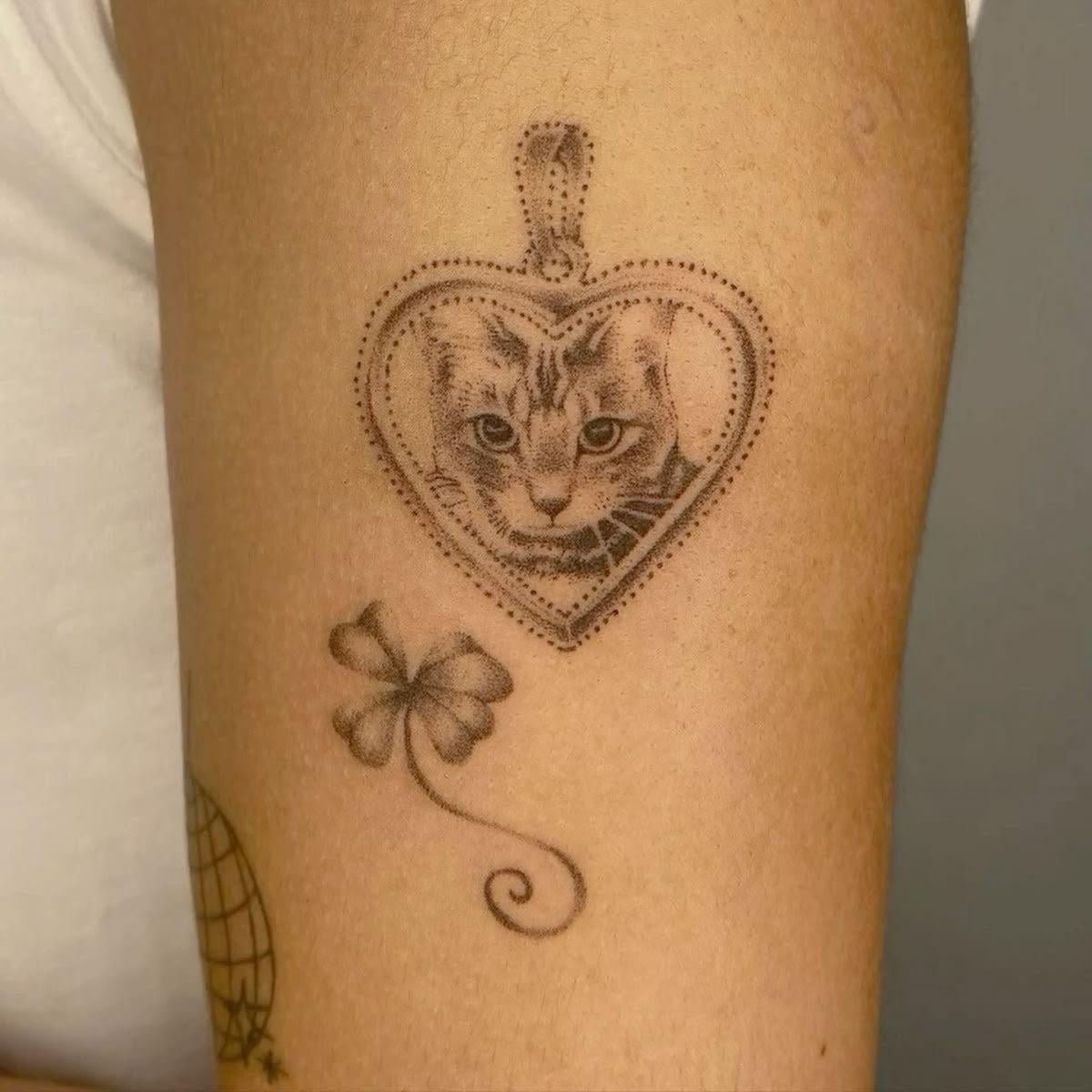 Photo of the tattoo titled Realistic Feline Portrait Tattoo