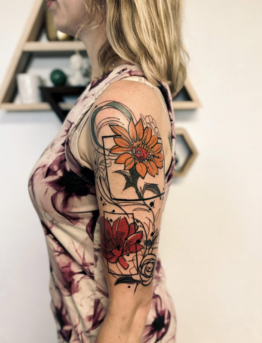 Photo of the tattoo titled Illustrative Flowers for a Poet