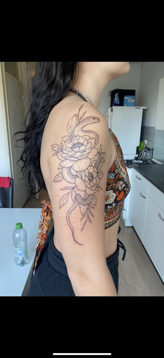Photo of the tattoo titled Koi Fish Rib Tattoo Design