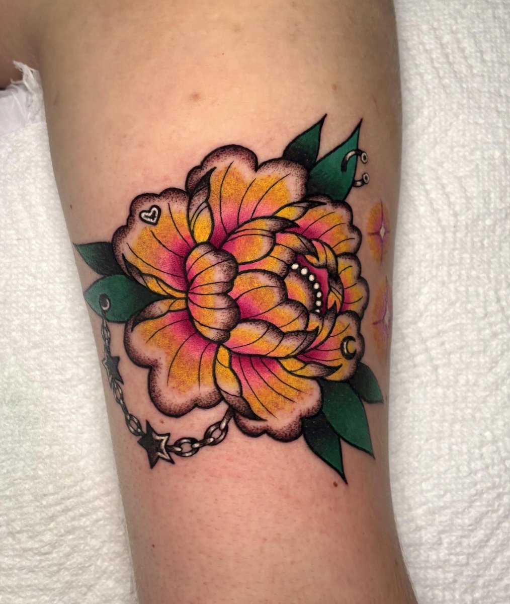 Photo of the tattoo titled My Own Pierced Peony Tattoo