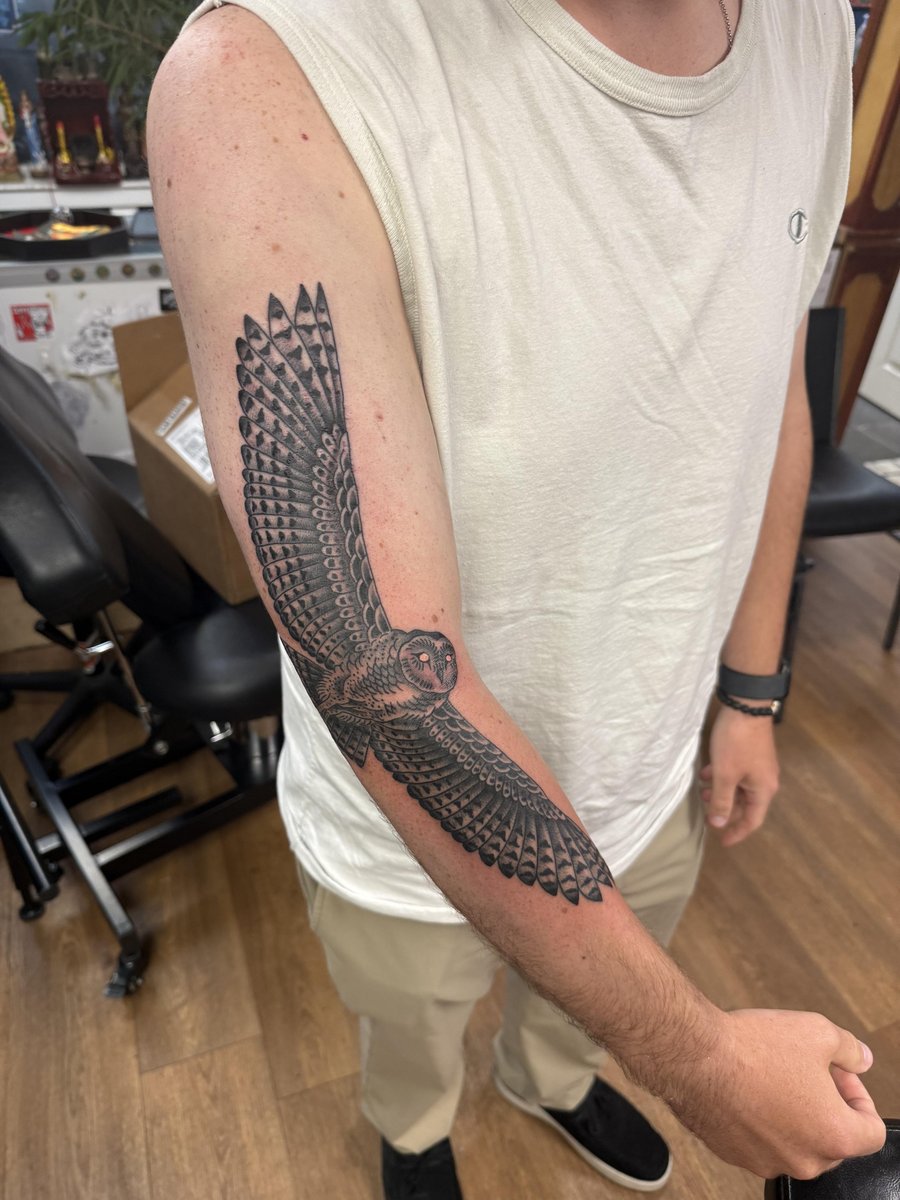 Photo of the tattoo titled Barn Owl and Deftones Tribute
