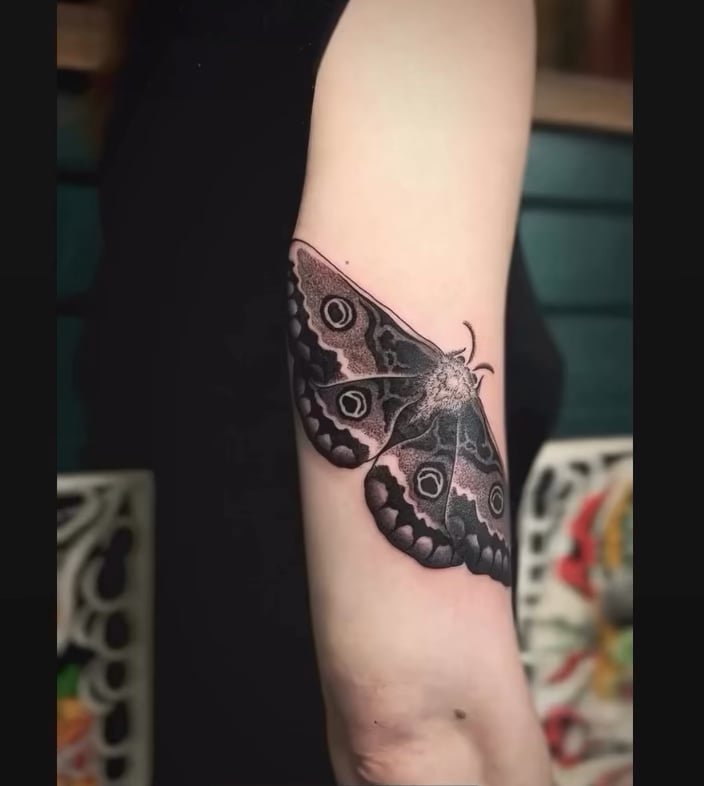 Photo of the tattoo titled Moth's Transformation Symbolism