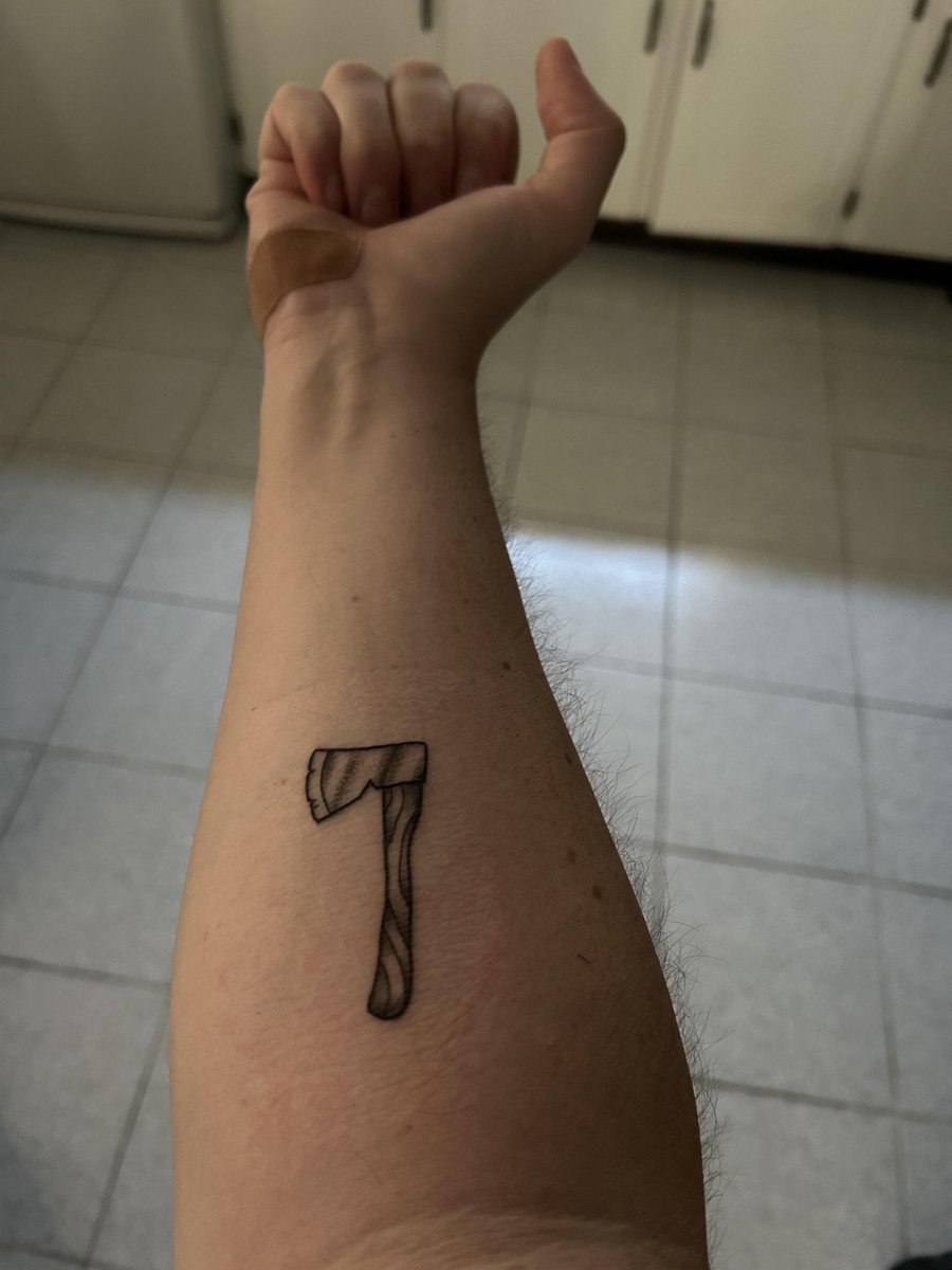 Photo of the tattoo titled Axe Throwing League Memories Tattoo