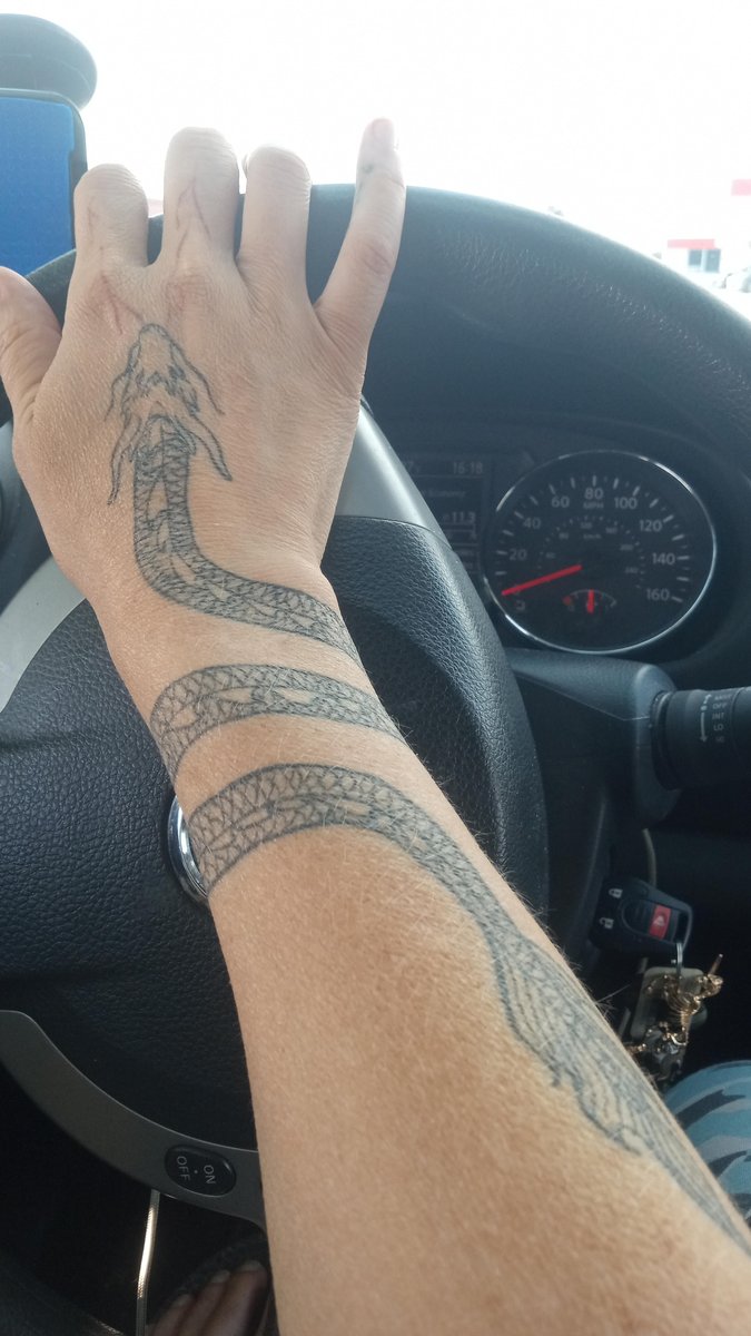 Photo of the tattoo titled Dragon Guardian from a Rainy Night