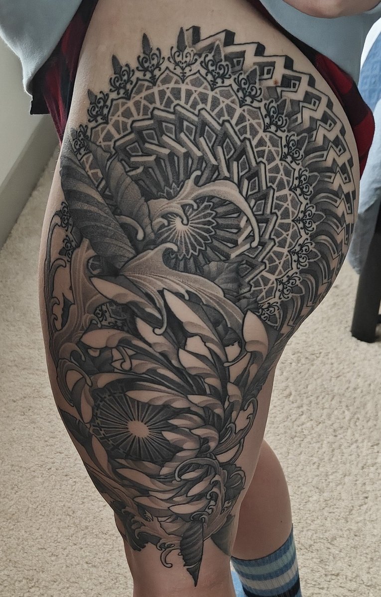 Photo of the tattoo titled Denver Artistry on My Thigh