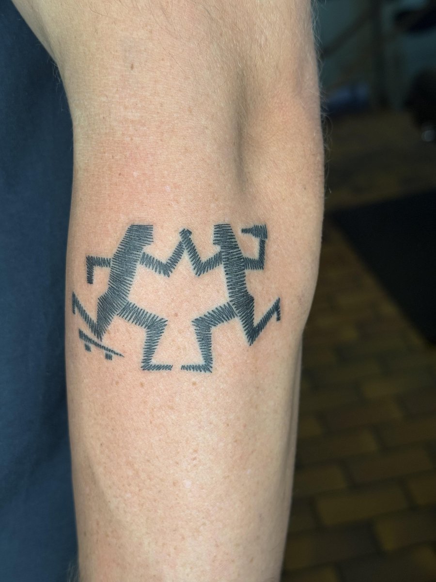 Photo of the tattoo titled Misunderstood Symbol of Peace