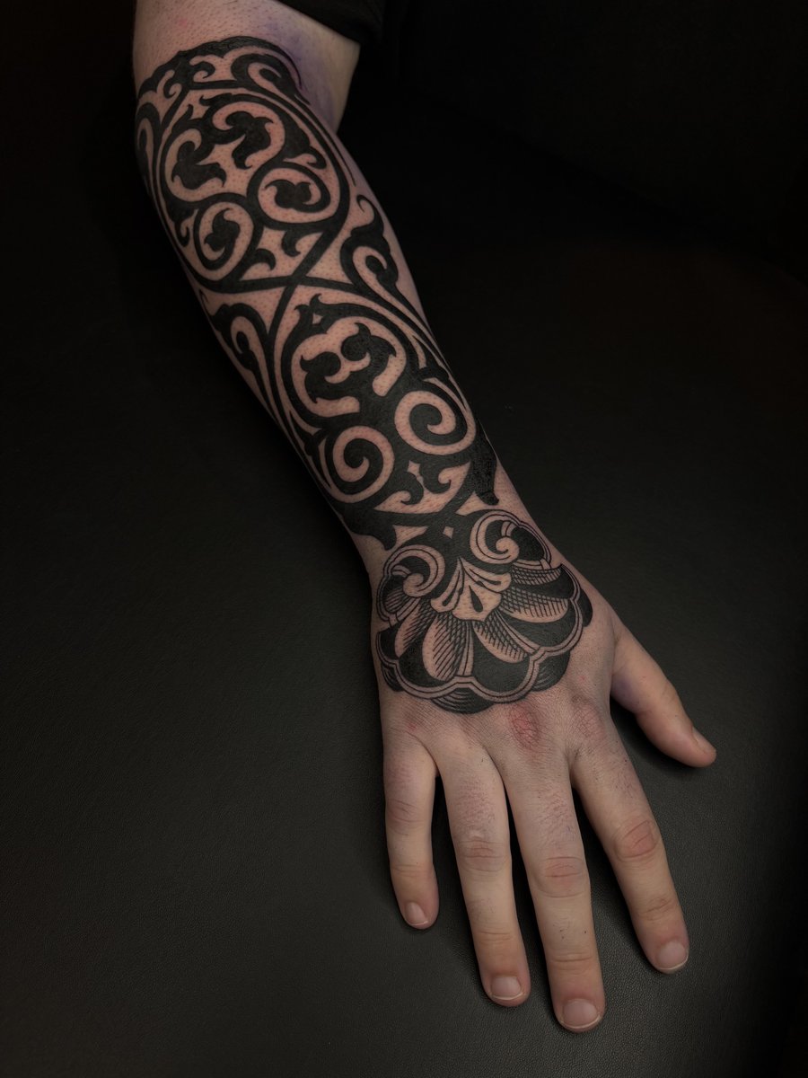 Photo of the tattoo titled Ornamental Forearm and Hand Masterpiece