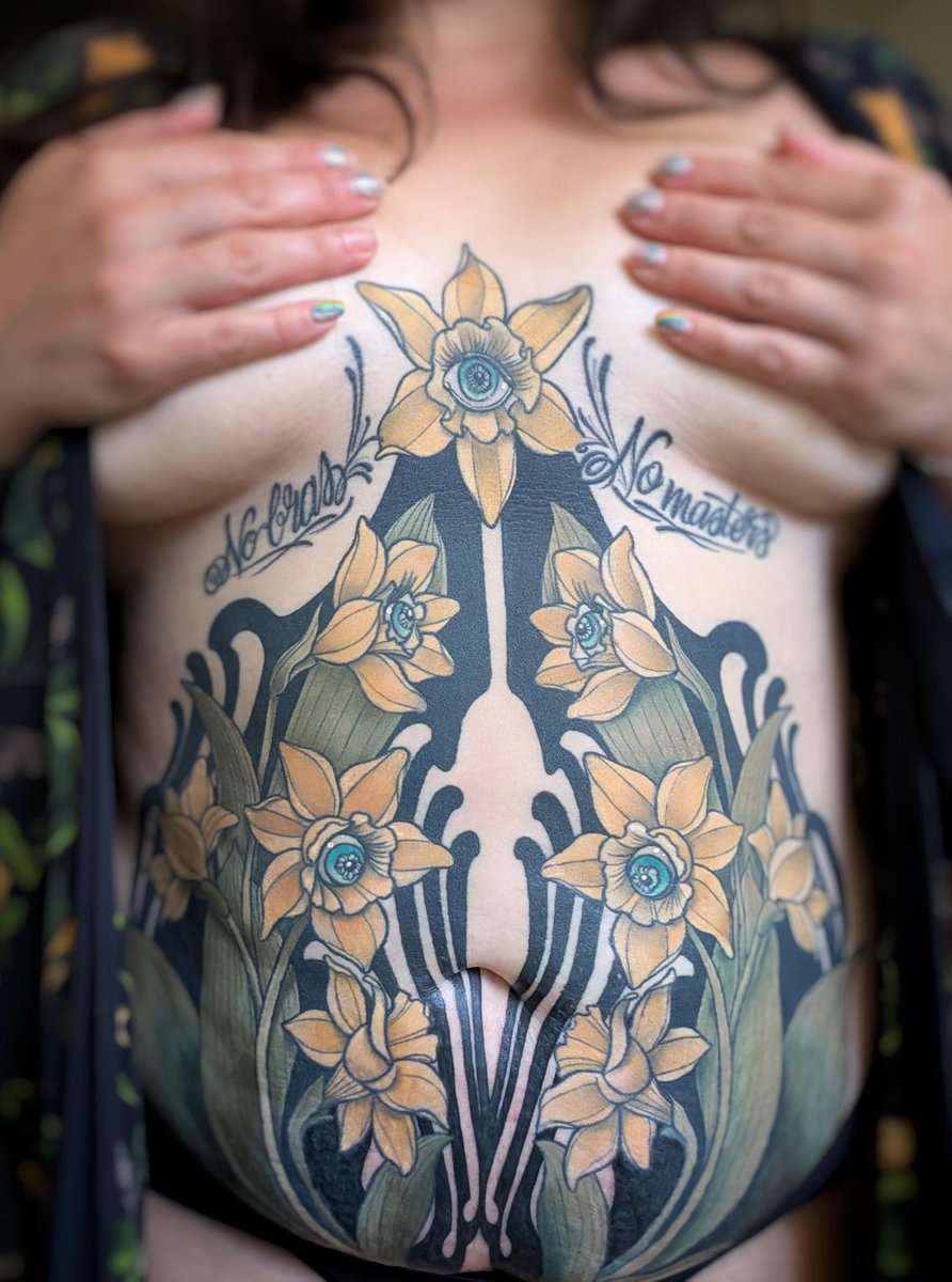 Photo of the tattoo titled Surreal Floral Tummy Piece