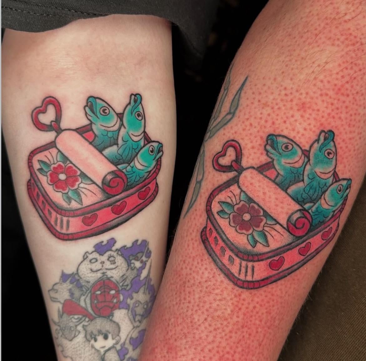 Photo of the tattoo titled Matching Sardines: A Sisterly Bond