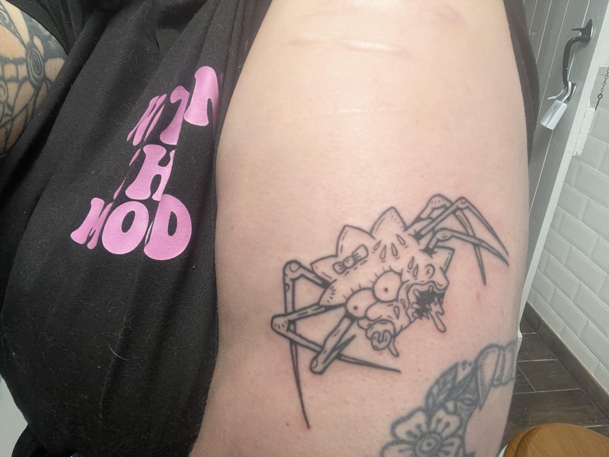 Photo of the tattoo titled Maggie Simpson As A Spider