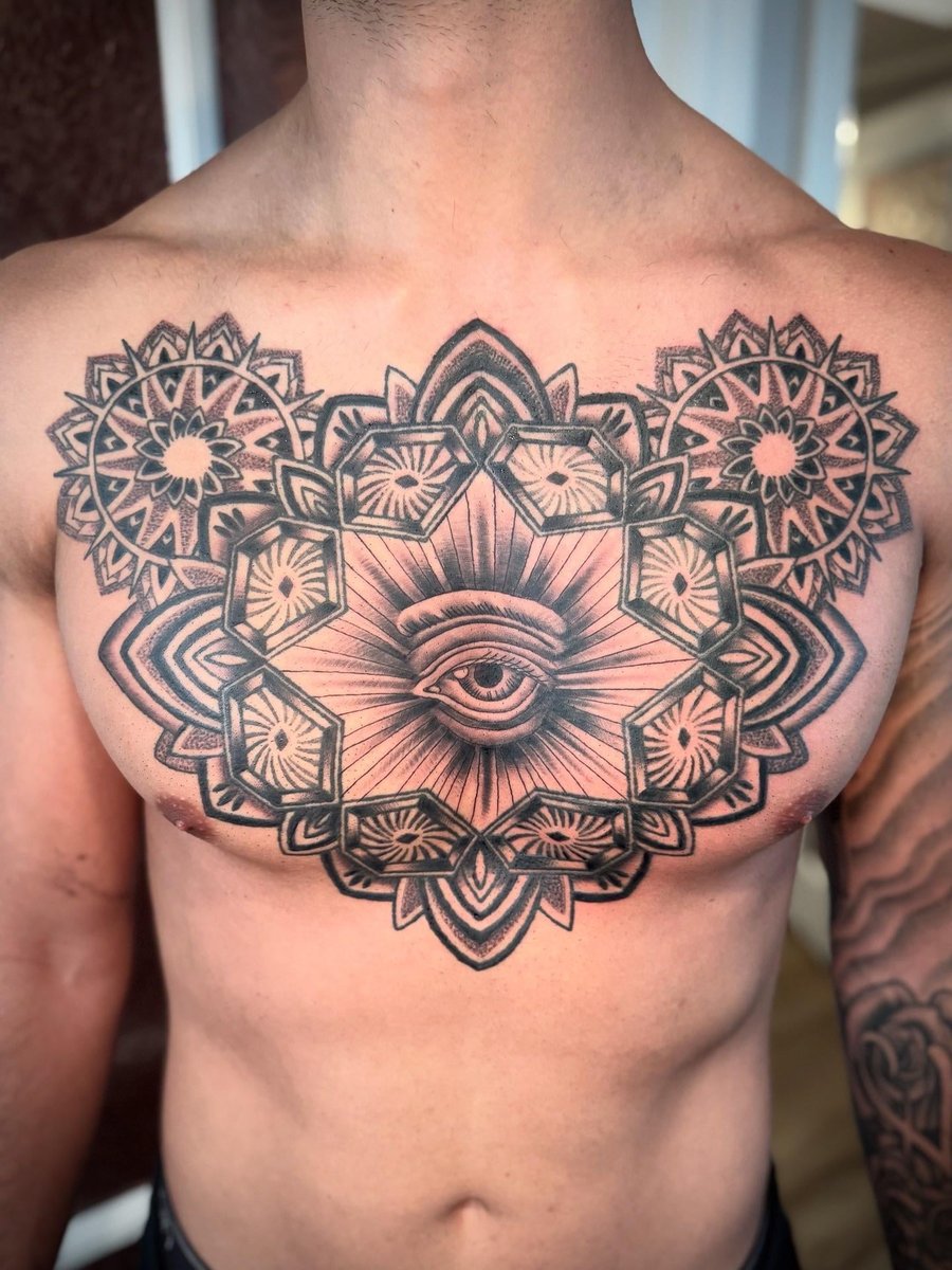 Photo of the tattoo titled Intricate Geometric Chest Piece