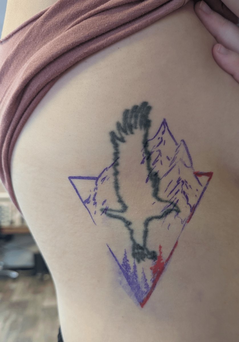 Photo of the tattoo titled Eagle Rework with Mountains
