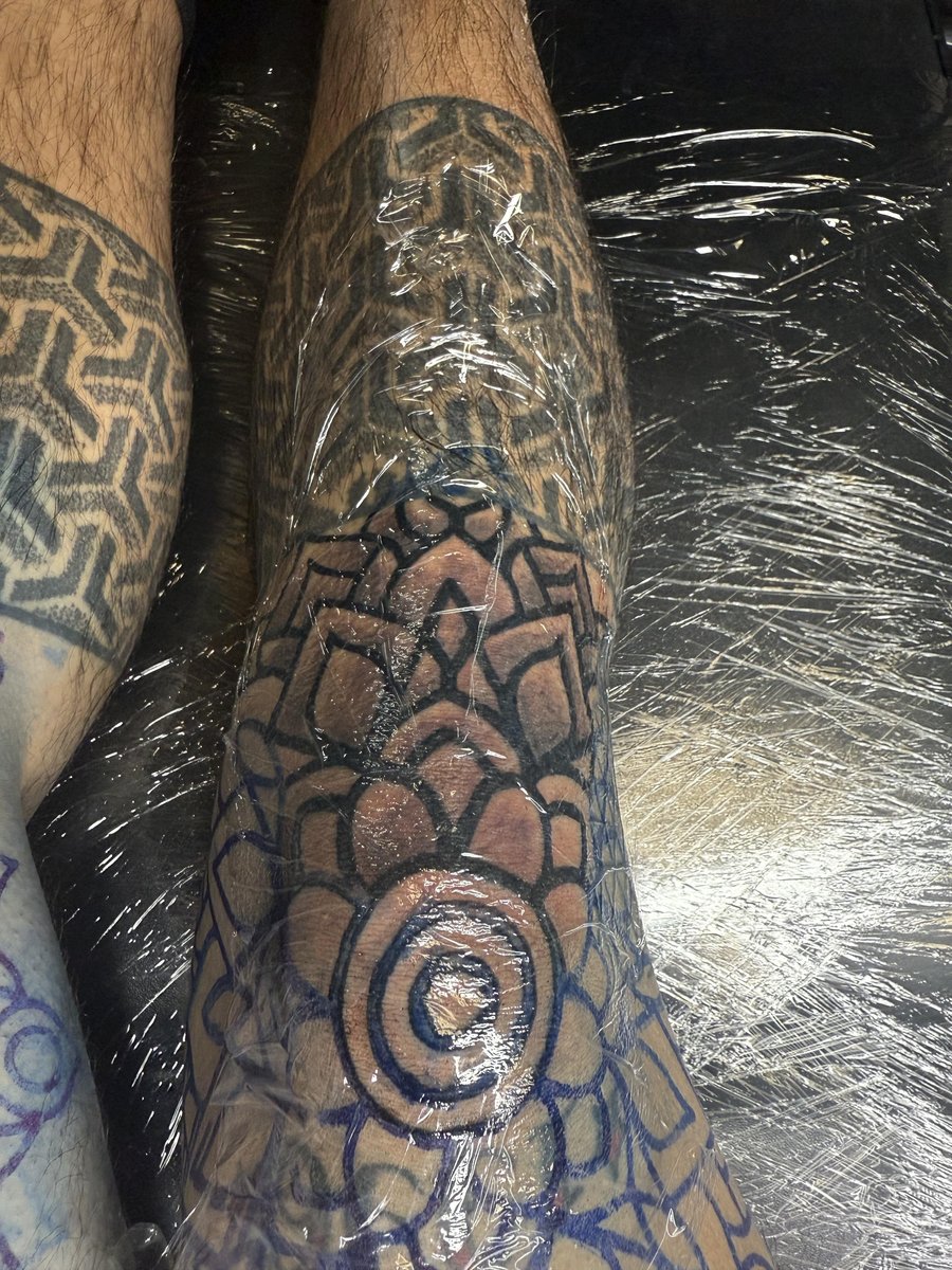 Photo of the tattoo titled Dual Knee Blastover Unifies Ink