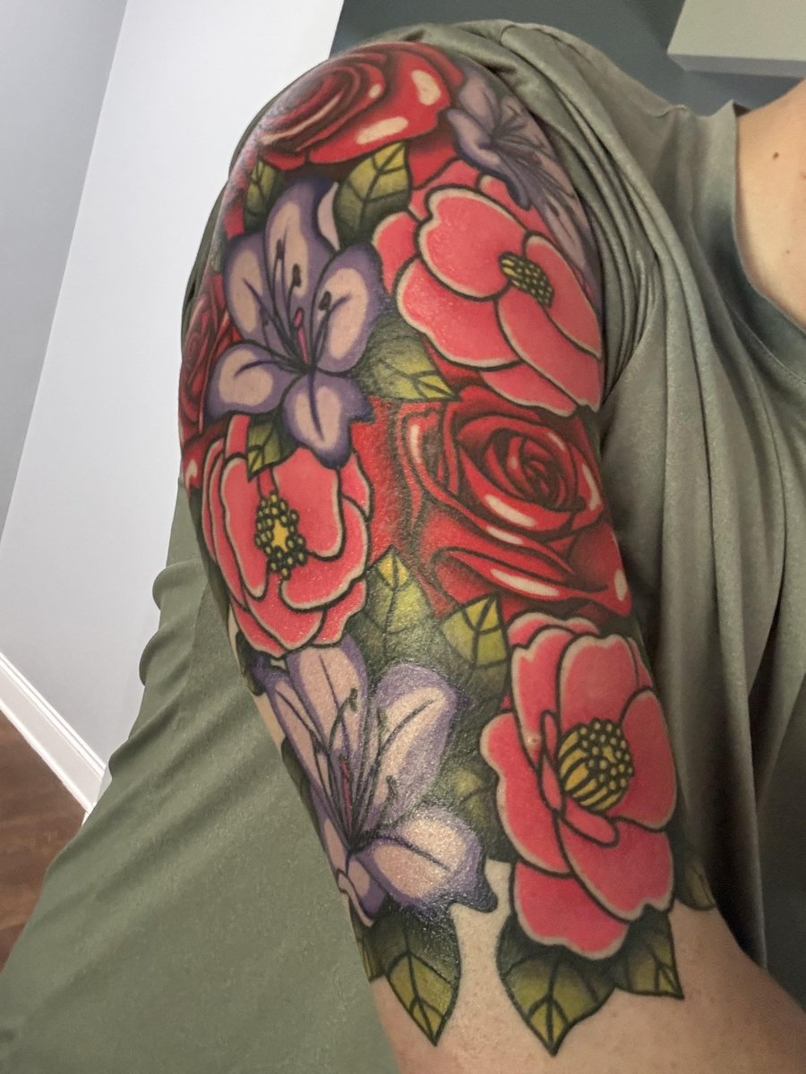 Photo of the tattoo titled Vibrant Floral Half Sleeve