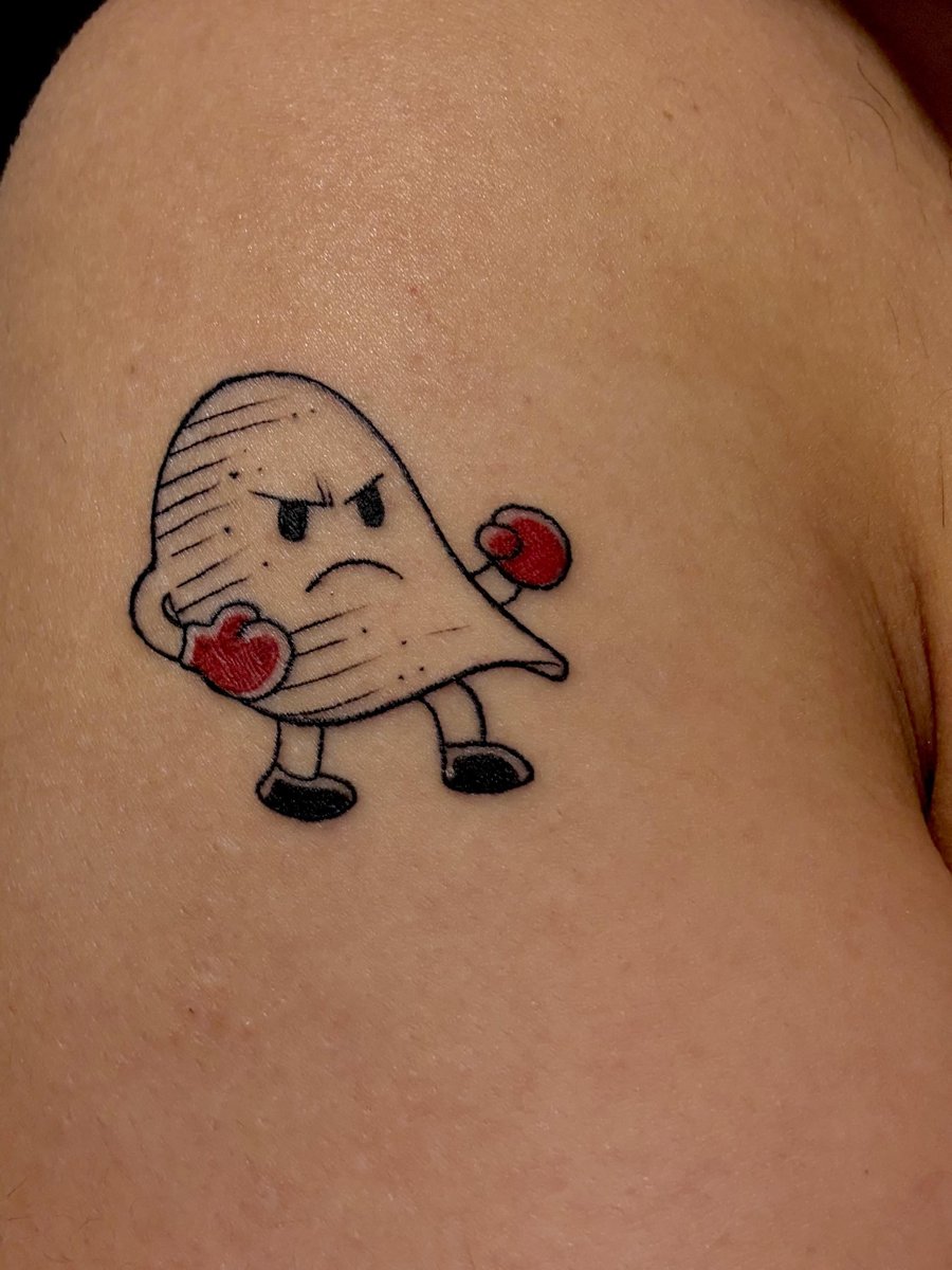 Photo of the tattoo titled A Chip on the Shoulder
