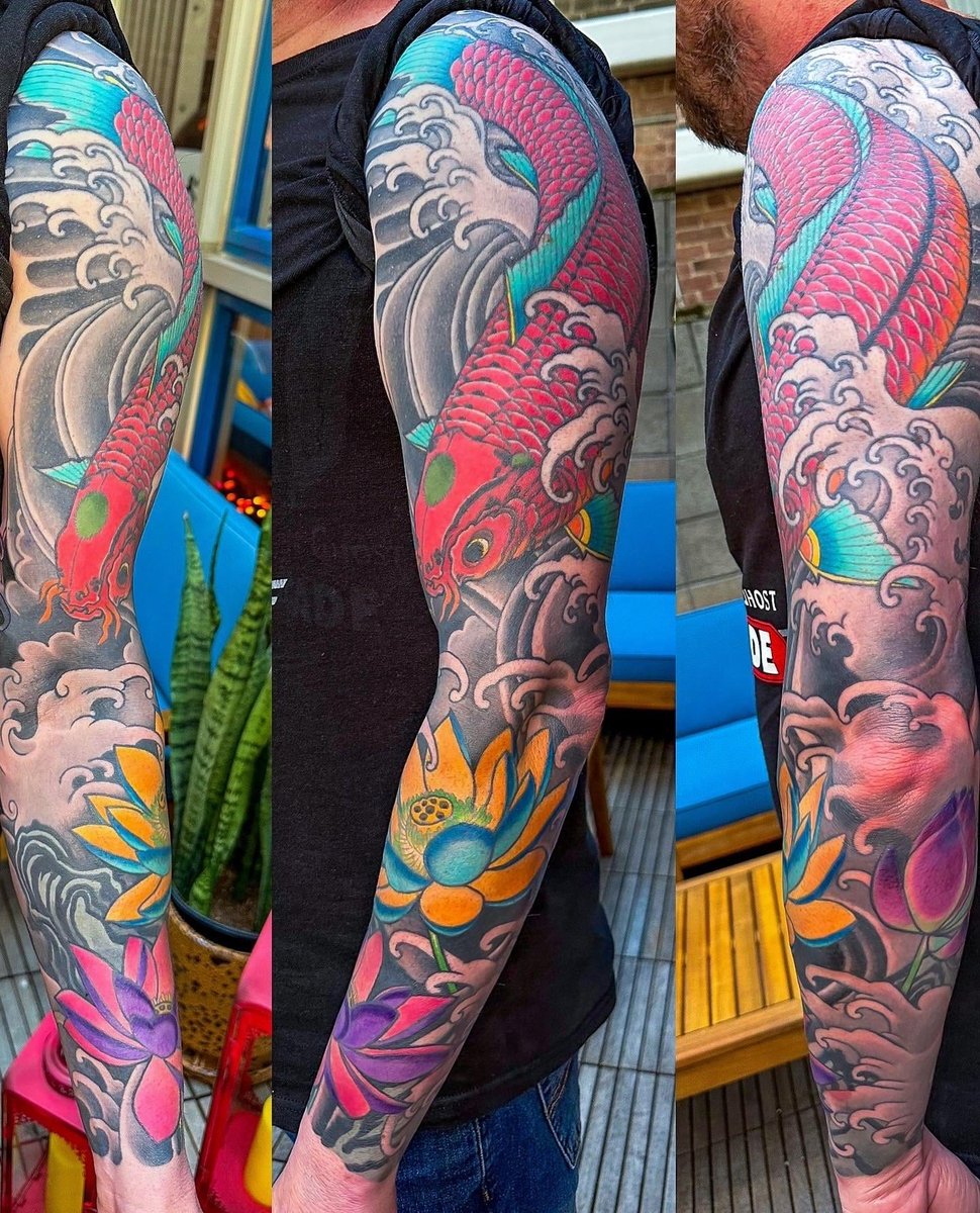 Photo of the tattoo titled Koi and Lotus Sleeve Extension