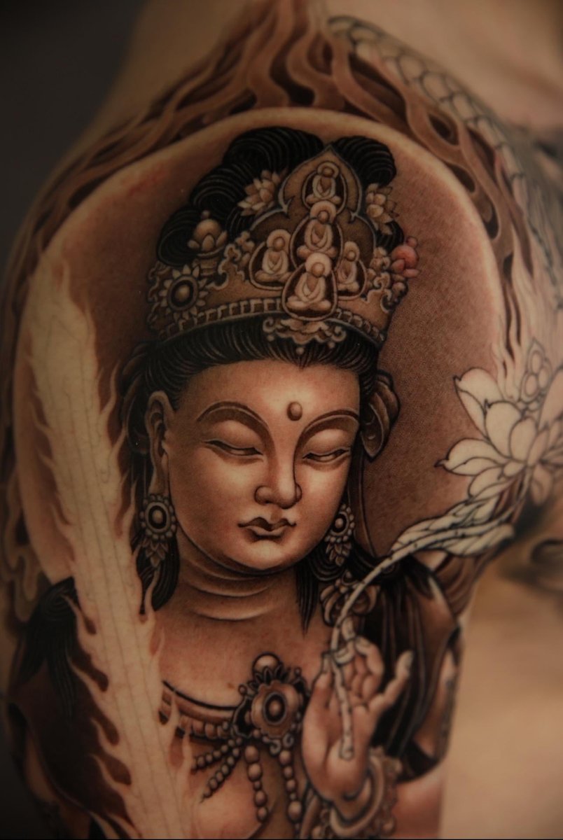 Photo of the tattoo titled Bodhisattva, Dragon, and Foo Dog Sleeve