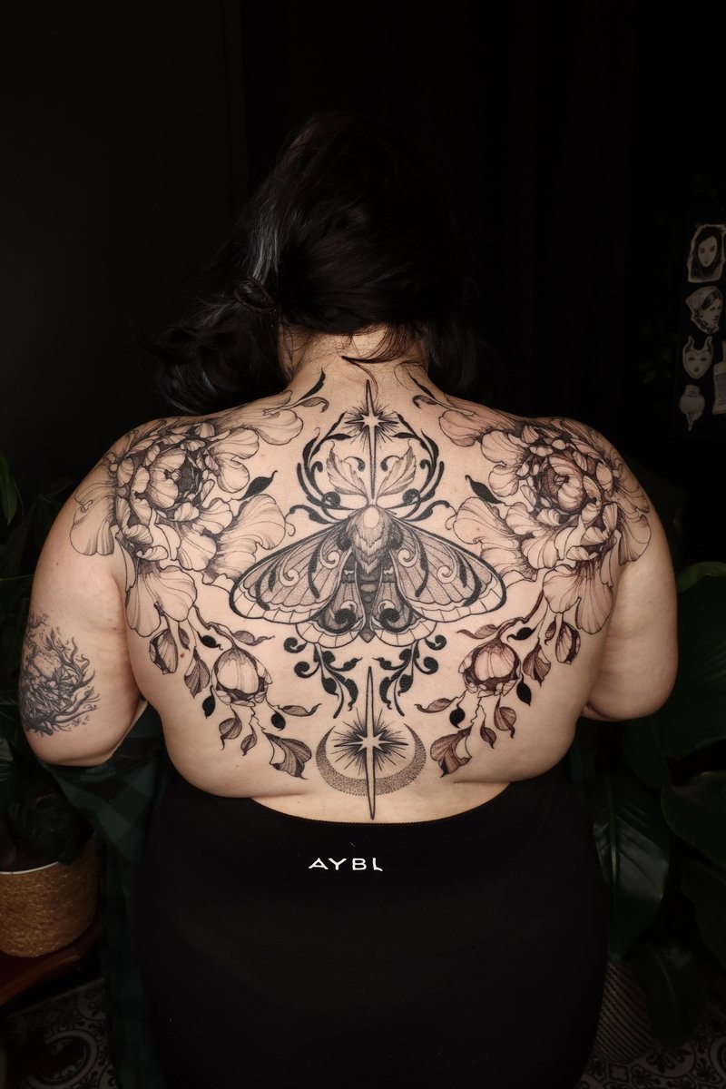 Photo of the tattoo titled Moth and Peony Back Piece
