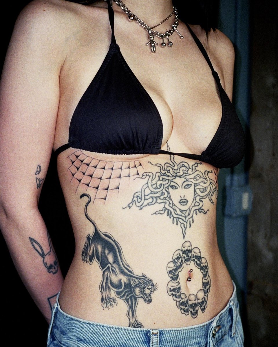 Photo of the tattoo titled Healed Panther and Skull Ring