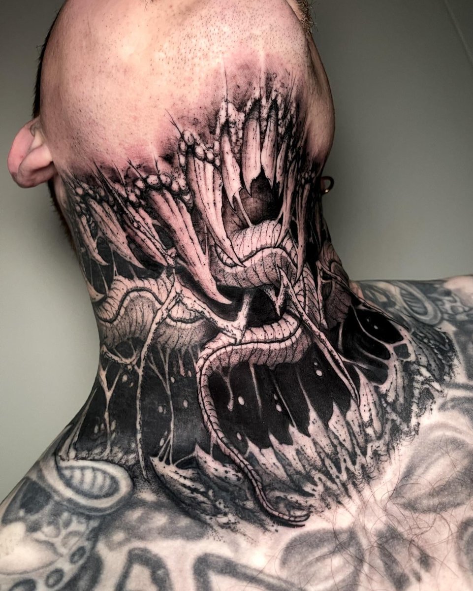 Photo of the tattoo titled Freehand Throat Cover-Up