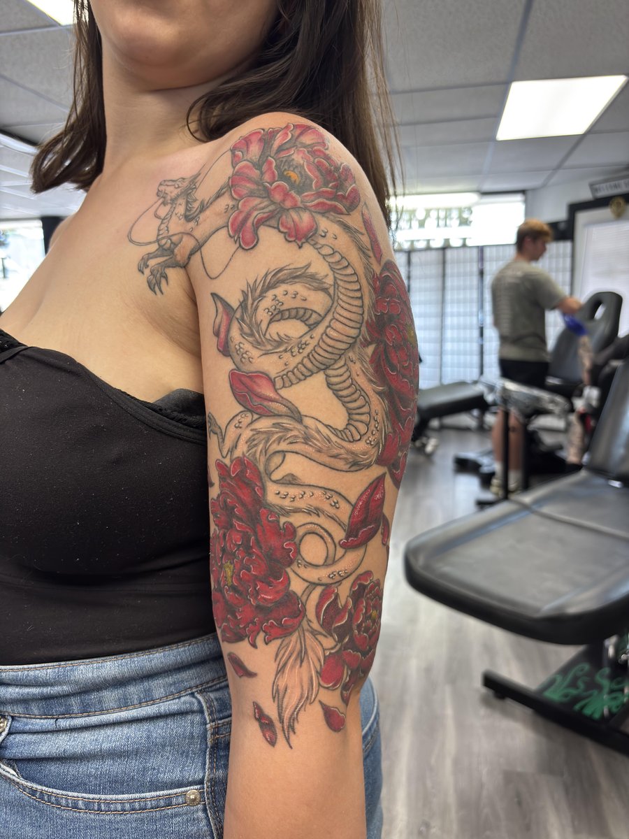 Photo of the tattoo titled Haku Dragon with Red Peonies