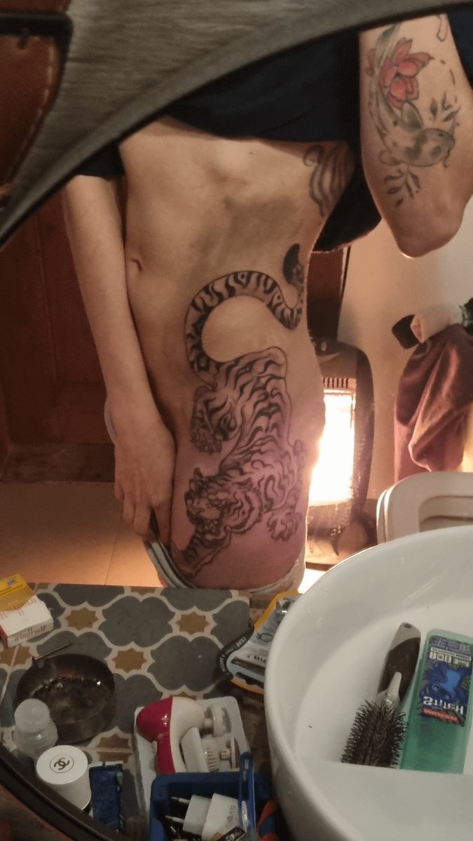 Photo of the tattoo titled Questioning the Orange Hue