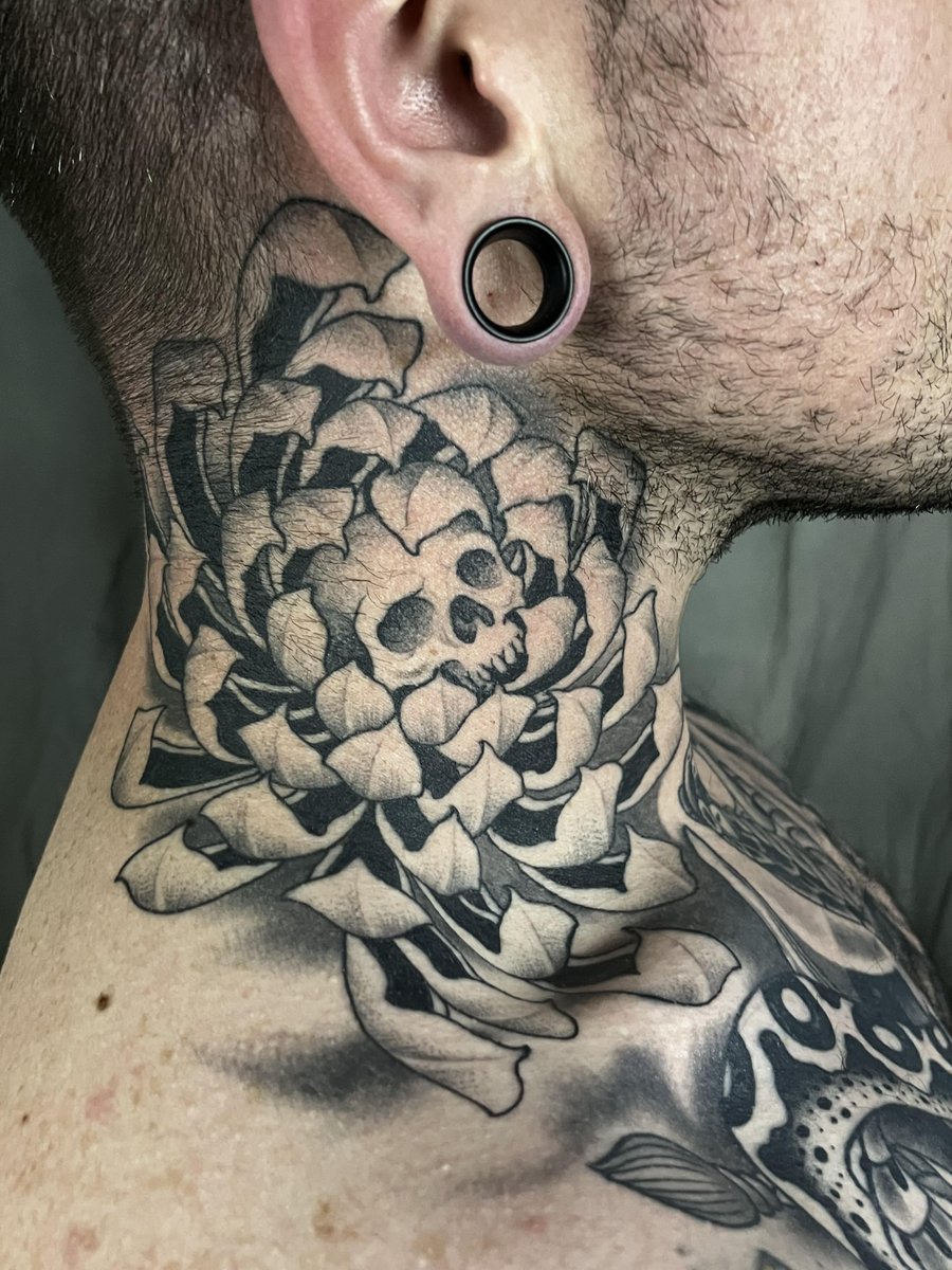 Photo of the tattoo titled Healed Neck Tattoo
