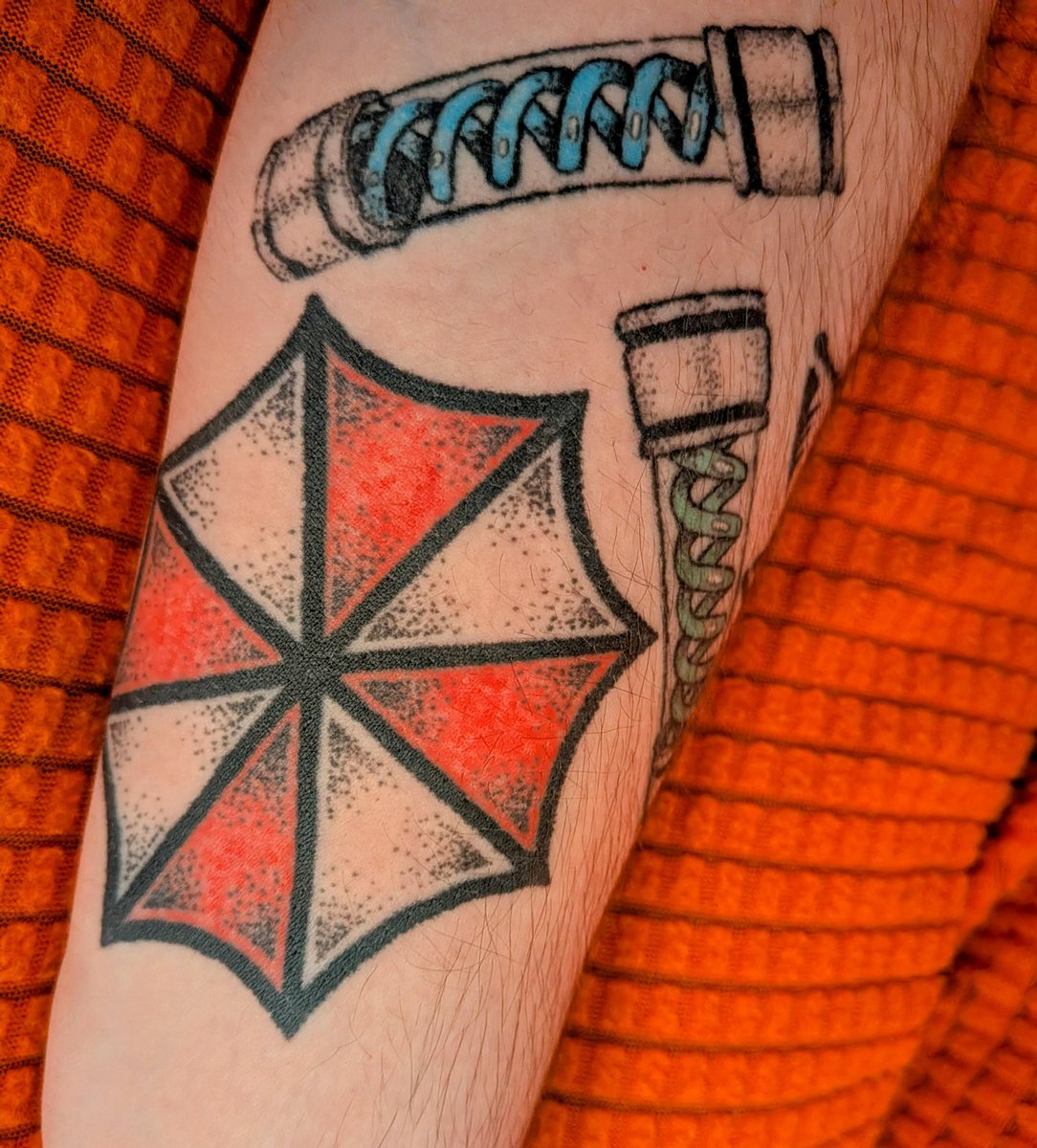 Photo of the tattoo titled Resident Evil Biohazard Symbol