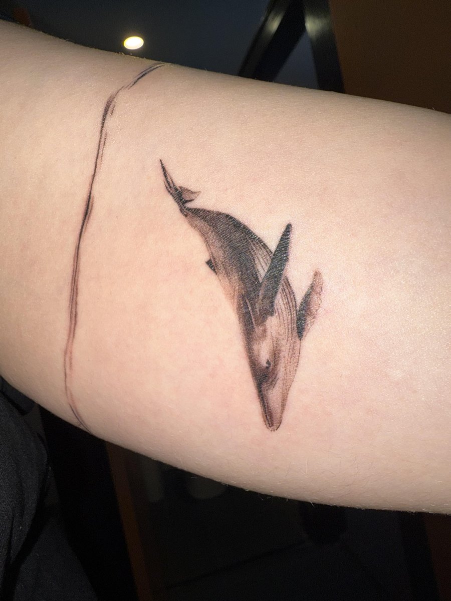 Photo of the tattoo titled My cute little whales