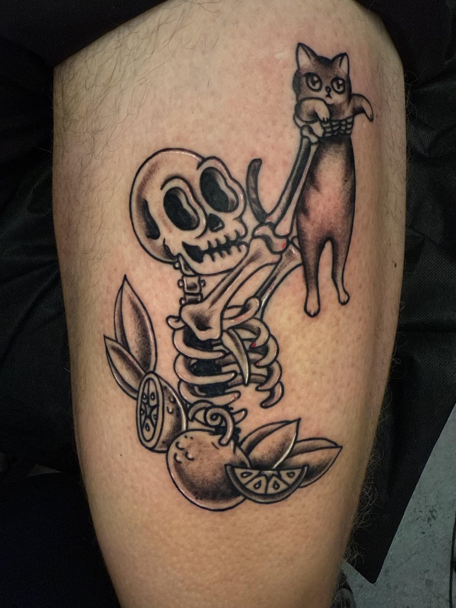 Photo of the tattoo titled Skellycat - A Feline Companion