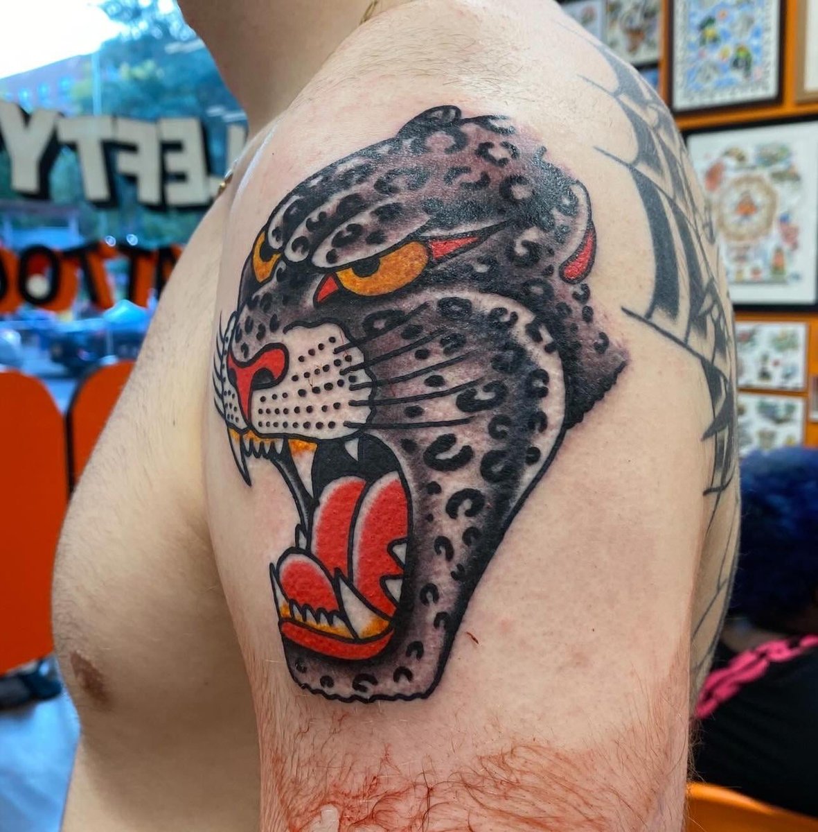 Photo of the tattoo titled Majestic Big Cat Roars to Life