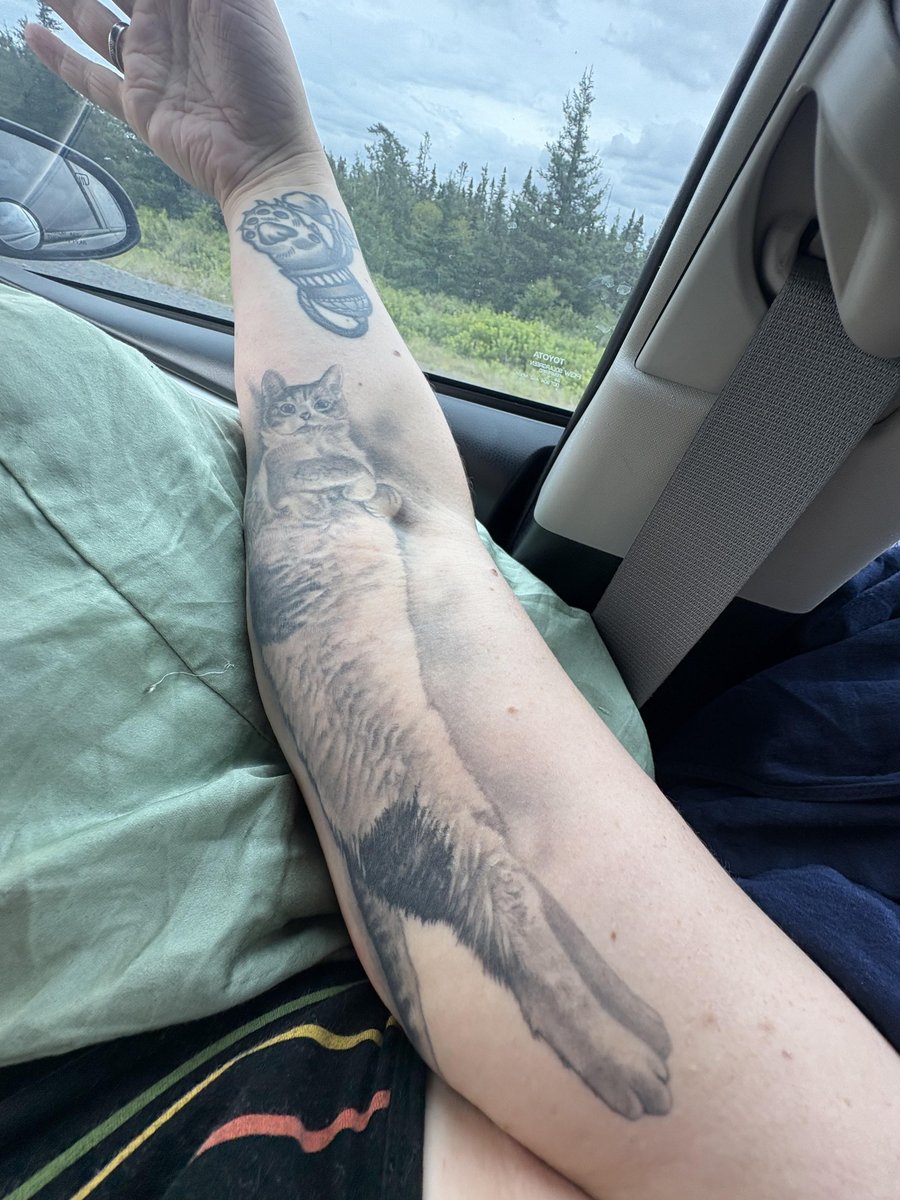 Photo of the tattoo titled Lucy's Paw Print Forever