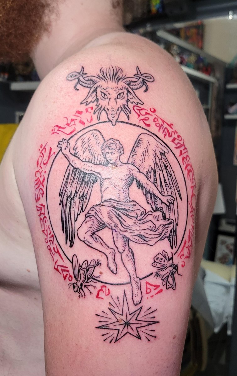 Photo of the tattoo titled Angel with script tribute