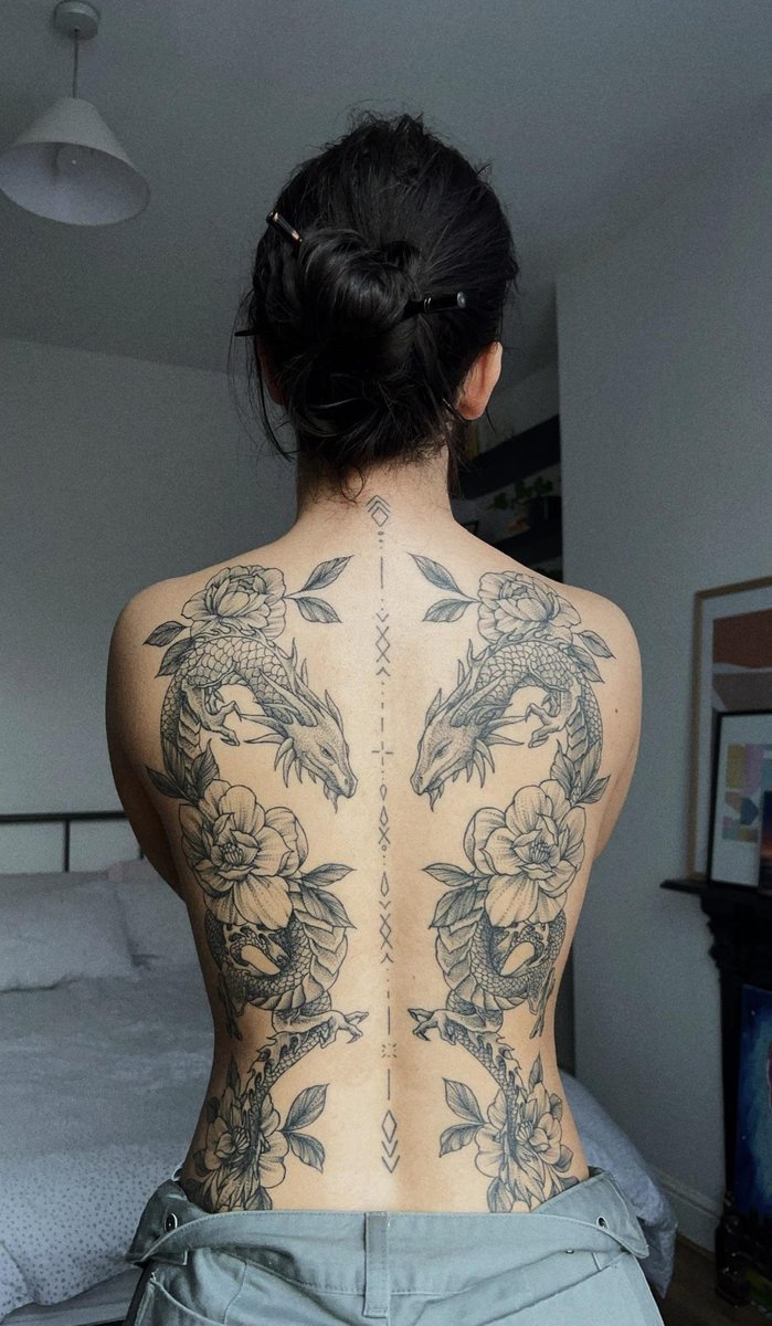 Photo of the tattoo titled Matching Dragon Tattoos