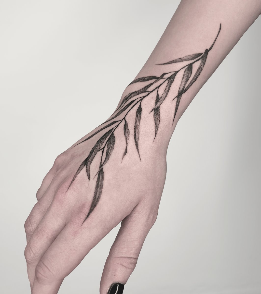 Photo of the tattoo titled Floral Hand Piece Art