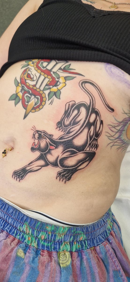 Photo of the tattoo titled Vibrant Panther Stomach Piece